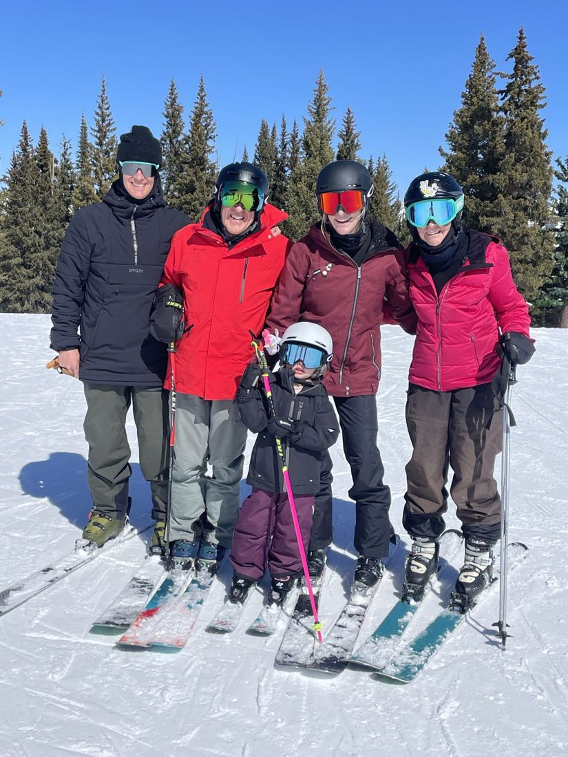 Three generations skiing together